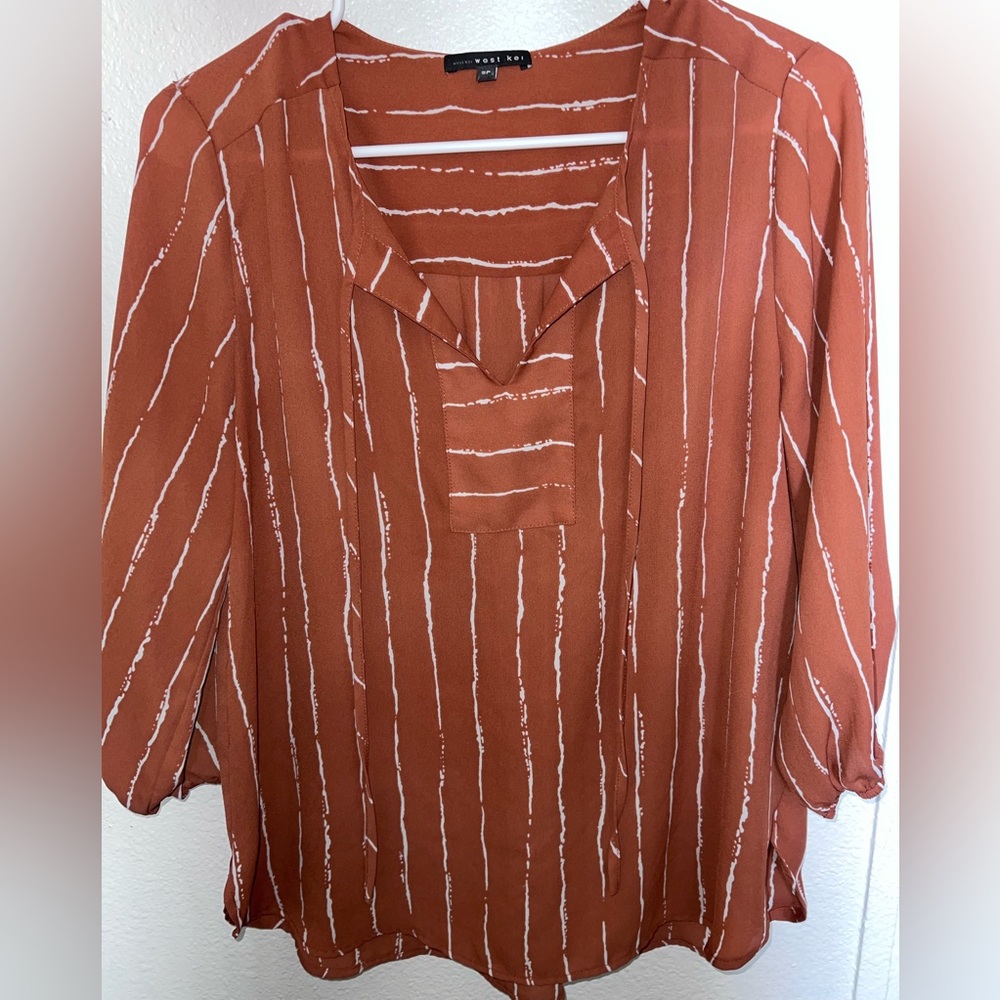 West Kei. Burnt orange with white lines